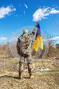 Armed Forces of Ukraine. Ukrainian soldier. Military uniform. Ukrainian flag