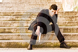 Armed man in stairs