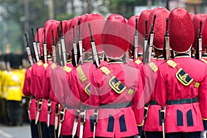 Armed Thai soldiers in parade uniforms