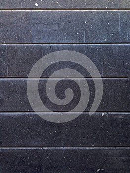 Black stone wall