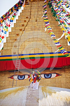 Armful of prayful flags as nose of a Bouda stupa