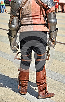 Armored knight with a sword ready to fight