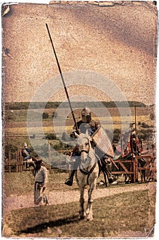 Armored knight on warhorse - retro postcard photo