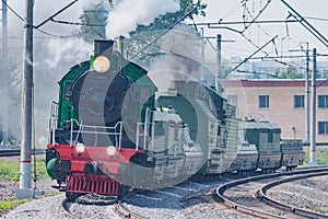 Armoured retro steam train moves