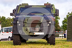 Armoured vehicle from german army stands on a field