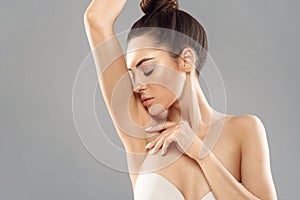 Armpit Epilation, Lacer Hair Removal. Young Woman Holding Her Arms Up And Showing Clean Underarms,