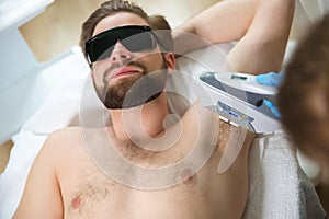 Armpit laser epilation at beautician`s