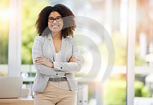 Arms crossed, management and portrait of business woman in office for leadership, vision and pride. Goals, smile and