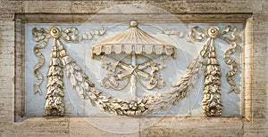 The arms of the Holy See under sede vacante, on the facade of the Basilica of Saint John Lateran in Rome, Italy. photo