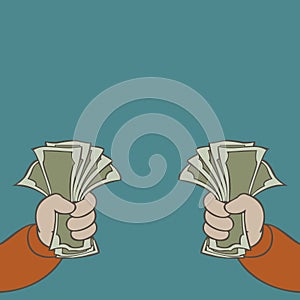 Arms with money in fist on a green background