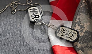 army blank, dog tag with text war peace on the khaki texture background. military concept