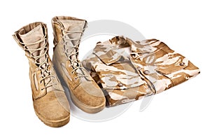 Army boots and military uniform isolated on white background