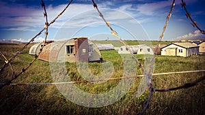 Army Camp Behind Razor Wire Fence