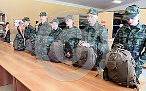 Army conscripts receiving military uniform