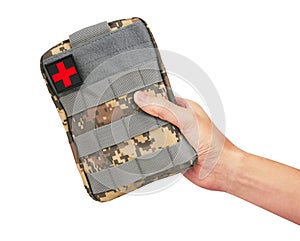 Army First Aid Kit in hand