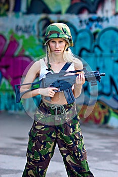 Army girl with rifle