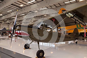 Army green Cessna O-1E airplane called birddog