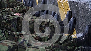 Army - military boots, soldiers in uniform standing in line