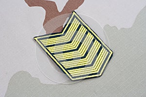 ARMY Sergeant rank patch on desert uniform