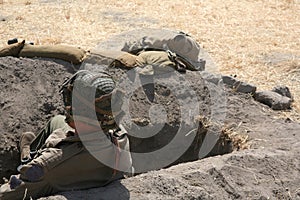 Army soldier in foxhole photo