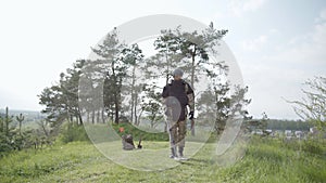 Army soldier removes mines, sapper with examines territory, minesweeper uses a mine detector