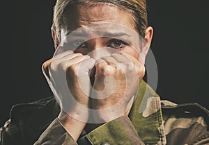 Army, trauma and mental health struggle of a woman veteran from war and soldier work. Portrait of a military worker and