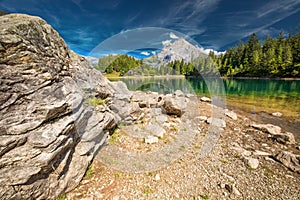 Arnisee with Swiss Alps. Arnisee is a reservoir in the Canton of Uri, Switzerland, Europe