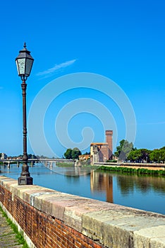 Arno River and Cittadella e Guelfa, tower. Pisa, Tuscany. Italy. photo