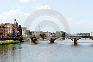 Arno River, Florence, Italy with magnificent houses lining the shore photo