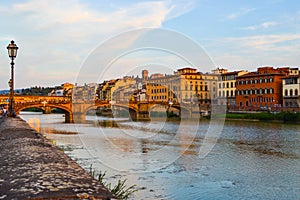 Arno river with Ponte Santa Trinita Holy Trinity Bridge and Po