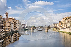 Arno river and St Trinity bridge designed by Bartolomeo Ammanati and reconstructured after World War II in Florence, Italy