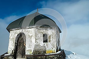 Arnoldhoehe - Scenic view of chapel on majestic mountain peak Arnoldhoehe in Ankogel Group in High Tauern