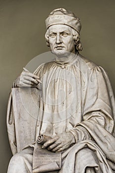 Arnolfo di Cambio statue in Florence, Italy photo