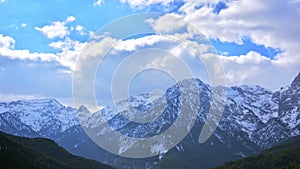 Aroania covered by snow in winter. Rolling clouds on the top of Chelmos mountain in Achaea, Greece. Time-lapse. Static shot