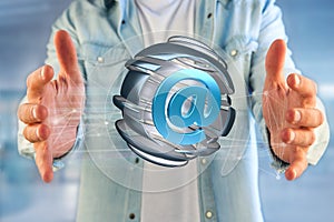 Arobase symbol displayed in a sliced sphere - 3D rendering