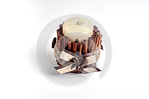 Aroma candle with cinnamon sticks