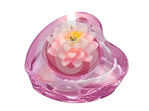 Aroma candle lotus in heart candlestick on a white