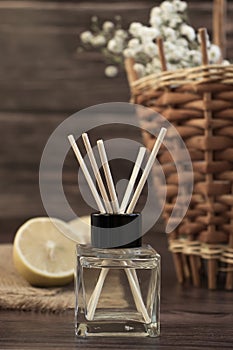 Aroma diffuser, lemon composition  boards   holiday aromatic on a wooden background relaxation