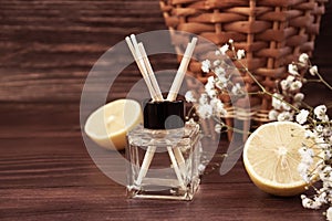 Aroma diffuser, lemon  freshener boards   holiday aromatic on a wooden background relaxation