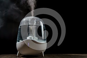 Aroma oil diffuser or air humidifier, increase in air humidity indoors