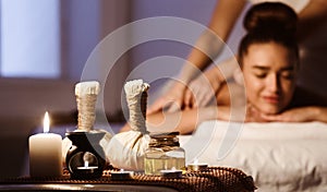 Aroma Spa. Woman Enjoying Back Massage In Luxury Spa