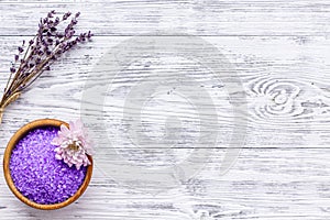 Aroma therapy with lavender flower fragrance and spa salt on white wooden background top view space for text