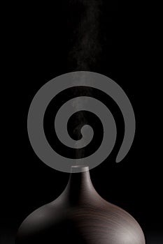 Aromatherapy diffuser. Modern electric essential oil atomizer in