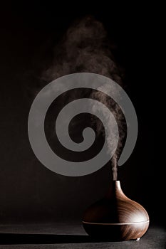 Aromatherapy essential oil diffuser device working.