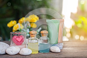 Aromatherapy product spa of therapy massage with plumeria or frangipani flowers, stones, aroma candle and oil on the desk,Spa