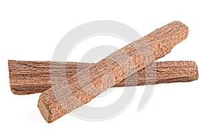 Aromatherapy - two scented sandalwood sticks isolated on white background. Aromatic natural wood incense