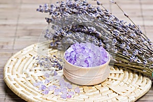 Aromatic bath salt and dry lavender flowers