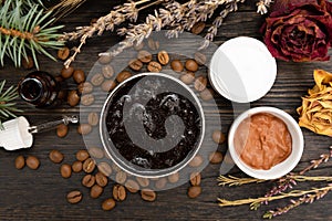 Aromatic botanical cosmetics. Dried herbs flowers mixture, aromatic homemade scrub paste made from coffee grounds and oils.