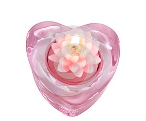Aromatic candle lotus flower in a glass candlestic