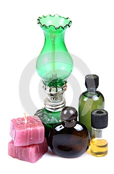 Aromatic candles and perfume bottles